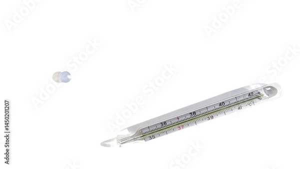 Obraz A broken medical mercury thermometer and a drop of mercury .isolated on a white background..