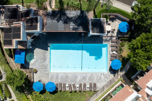 Fototapeta Aerial view of residential subdivision condominium house neighborhood with pool in Mission Mesa. South California, USA