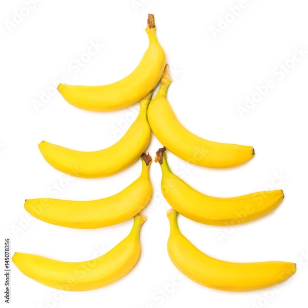 Fototapeta Bananas in the form of a Christmas tree isolated on white background