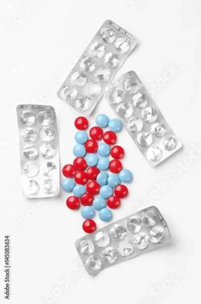 Fototapeta Colorful pills and blisters