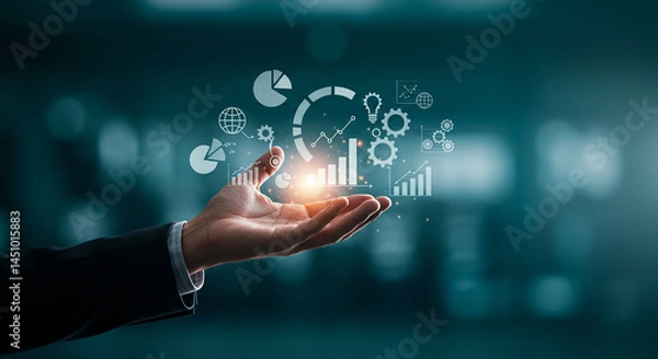 Fototapeta A hand holding glowing data analytics and business intelligence icons in a dark environment selling, purchasing, agreement, $