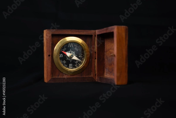 Obraz vintage compass on a black background