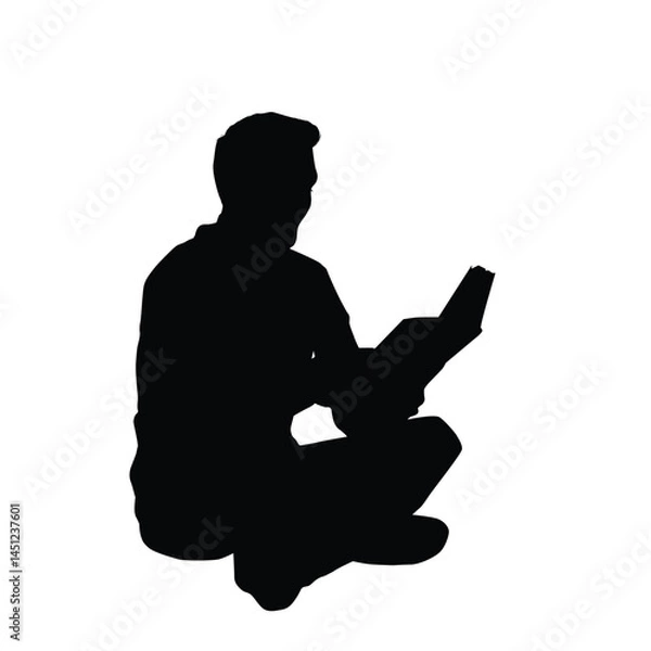 Fototapeta Silhouette of a man reading book