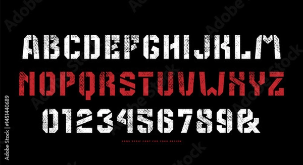 Fototapeta Stencil-plate sans serif font in the military style. Letters and numbers with rough texture for logo and emblem design. Color print on black background