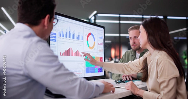 Fototapeta Businesswoman Managing Company Data Using Analytics Dashboard