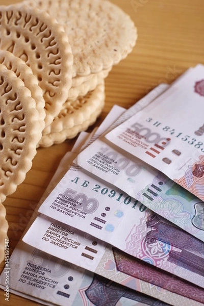 Obraz Russian banknotes next to biscuits