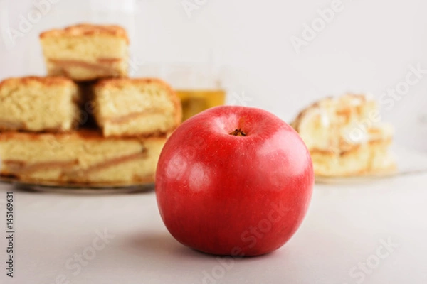 Fototapeta Red apple on the kitchen table