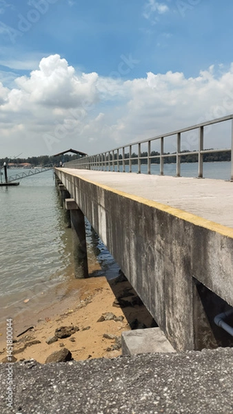 Obraz clear bright day at a jetty by the beach