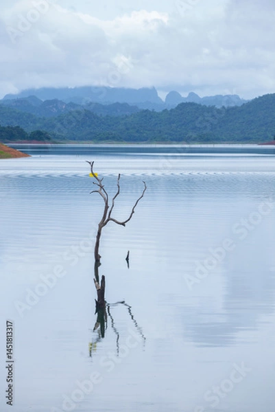 Fototapeta Khao Laem National Park's reservoir viewpoint (Pom Pee) is a beautiful sunset viewing point. There are also bungalow and tents for tourists. Sangkhla Buri District, Kanchanaburi