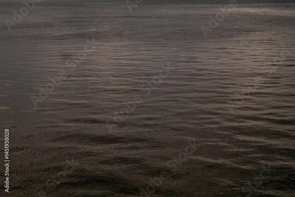 Fototapeta Water sea sunset. Sun reflection ocean waves. Nature golden abstract texture surface.