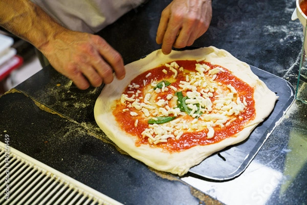 Obraz Chef preparing Neapolitan Margherita pizza