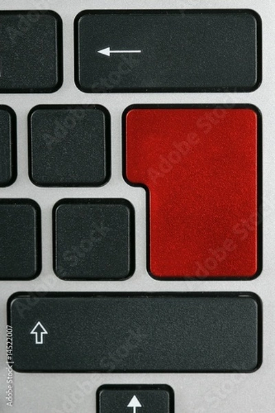 Fototapeta Keyboard with enter key in red color