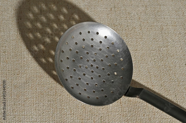 Fototapeta perforated skimmer and its shadow
