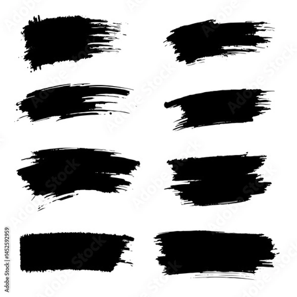 Fototapeta Paint brush strips with rough edges and fading marks on white background. Black smeared streaks with natural ink texture and vertical movement. Grunge elements
