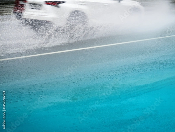 Fototapeta White car in motion in water splashes highway backdrop