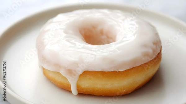 Obraz Perfectly Round Glazed Donut on Plate with Soft Frosting and Light Texture in Bright Background