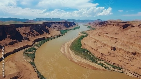 Fototapeta Aerial 4K Top View of a Mountain River | Clear Waters Flowing Through Rocky Terrain in Scenic Nature Landscape

