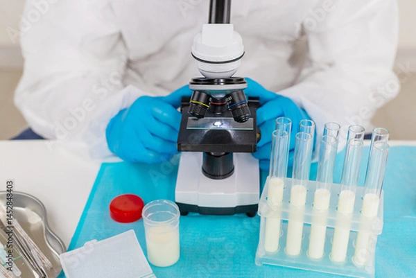 Obraz Examine milk in the laboratory. Selective focus.