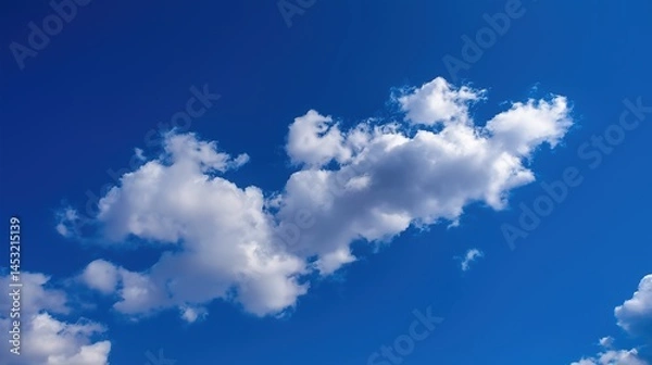 Fototapeta Vast blue sky with scattered clouds, a serene minimalist canvas of endless calm