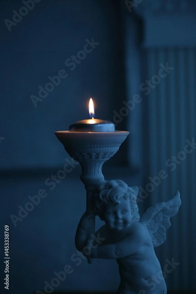 Obraz burning candle in a candlestick