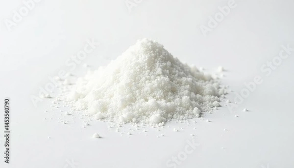 Fototapeta Pile of white granulated sugar on white background, background, pure, sweet
