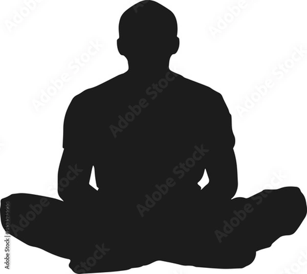 Fototapeta Silhouette of man sitting cross legged in relaxed pose