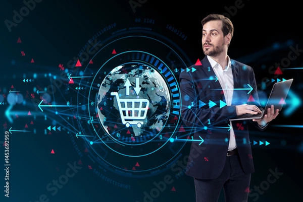Fototapeta Businessman using laptop with ecommerce hologram and digital sales icon overlay on abstract dark background representing online economy concept.