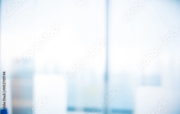 Fototapeta Abstract blurry background with white blue and light colors creating a soft effect.