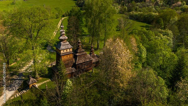 Fototapeta Aerial drone view of Orthodox church of Saint Cosmas and Saint Damian in Kotan, Poland.