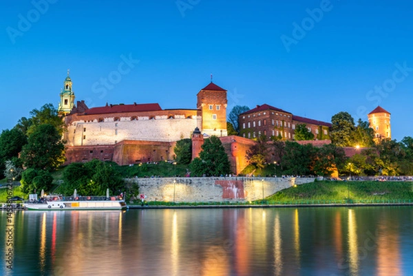 Fototapeta Evening View of Wawel Castle Reflected in Vistula Waters in Cracow , Poland