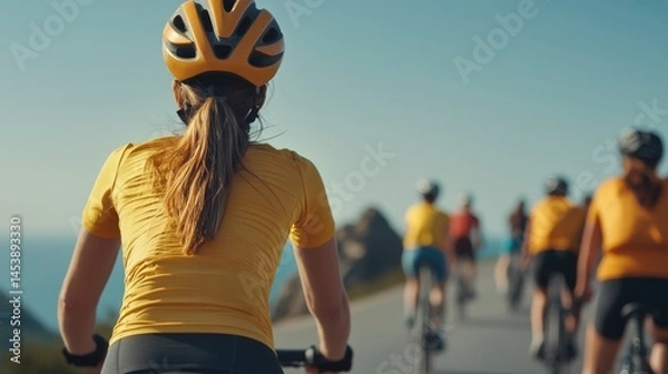Fototapeta Diverse Group of Cyclists Enjoying Scenic Ride Along Coastal Path