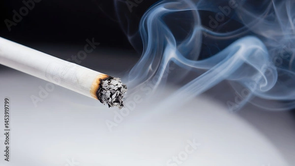 Fototapeta Isolated on a black backdrop, a white smoking cigarette releases toxic tobacco smoke, a visual representation of addiction, unhealthy habit, and the danger of cancer