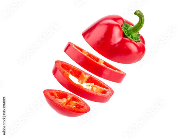 Fototapeta whole red chili pepper sliced into rings and falling in mid-air, isolated on white background
