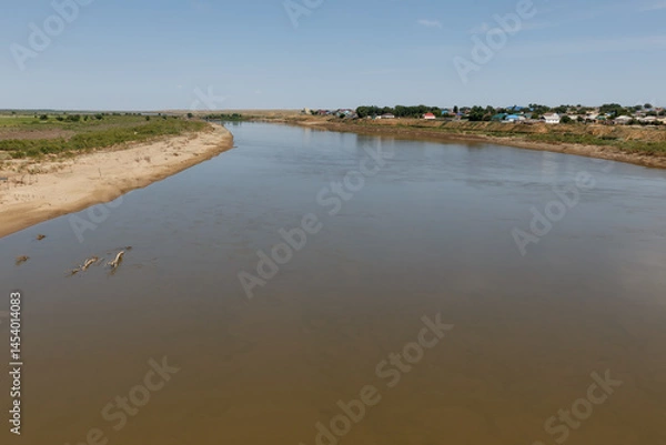 Fototapeta Ural River flowing through Inderbor settlement in Atyrau Region Kazakhstan