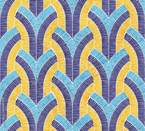 Fototapeta Seamless geometric art deco pattern with vibrant curved lines in blue, yellow, and dark purple. Imitation embroidery. Vector illustration.