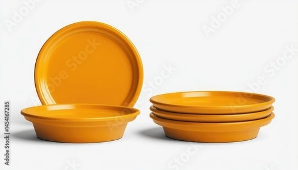 Obraz Stacked, bright yellow dinnerware set on white. Plain ceramic plates