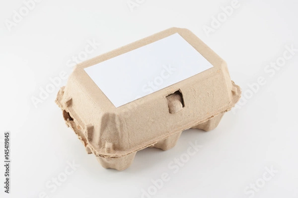 Obraz Paper egg box - egg carton on white background