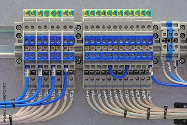 Fototapeta Electrical terminals with connected insulated copper wires with metal lugs. Marking with a thermal printer. 