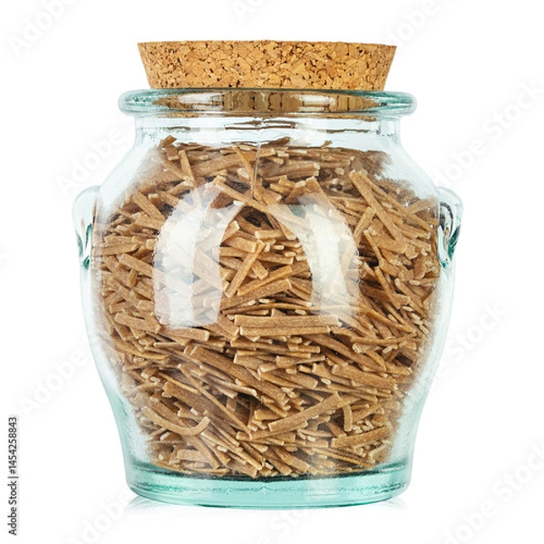 Obraz Glass jar filled raw pasta isolated on white background. File contains clipping path.