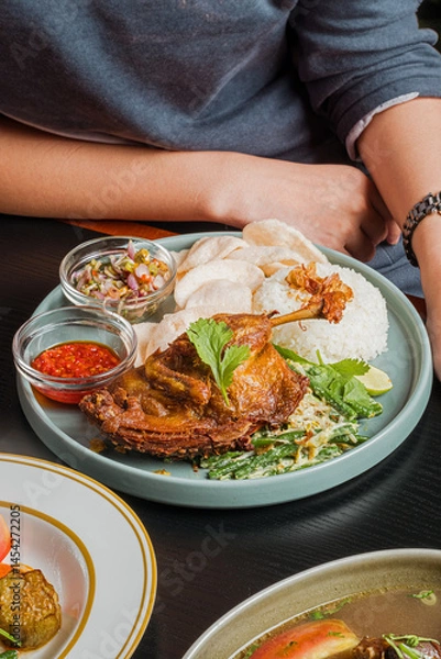 Fototapeta indonesian fried duck with rice