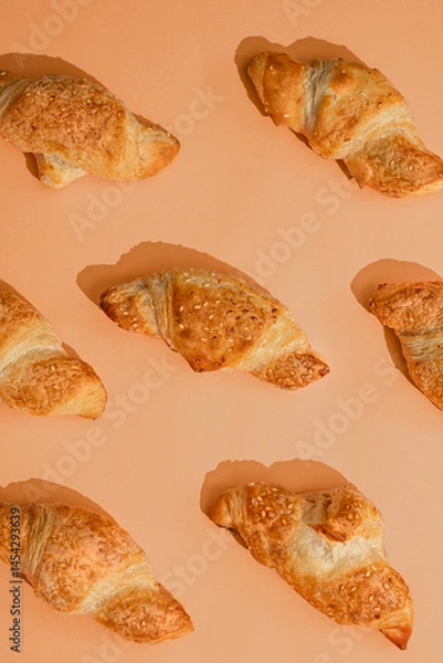 Obraz mini croissants on peach background - Croissant
