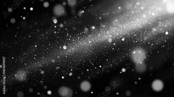 Obraz Monochromatic abstract background with numerous bright blurred particles, bokeh effect and soft glowing light source emanating from the upper right