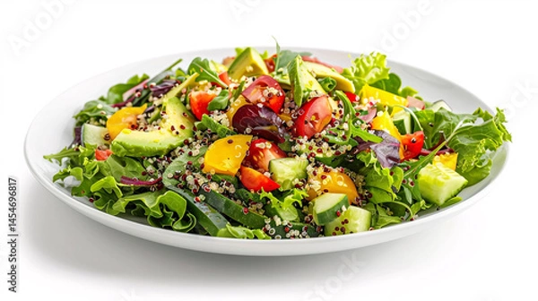Fototapeta A colorful and healthy salad with avocado, quinoa, and fresh vegetables on a white plate.