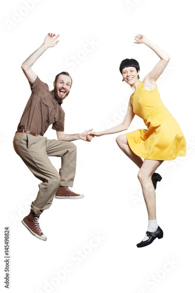 Fototapeta Rock'n'roll dance boogie woogie. Boogie acrobatic stunt in a studio background. Dance for rock-n-roll music.