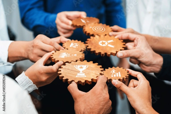 Fototapeta Team Collaboration and Strategy Development with Wooden Gear Symbols Representing Business Goals and Achievements in a Professional Environment. Amity