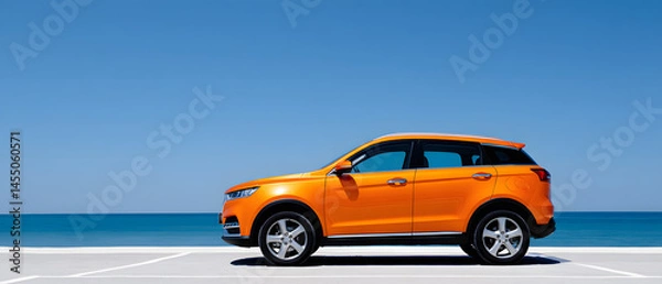 Fototapeta Single orange car in a parking lot. Contrast day light, ocean on background. Banner with copy space. Unbranded SUV. 