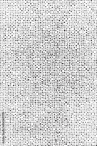 Fototapeta A dense array of small black dots creates a textured surface with subtle gradations.