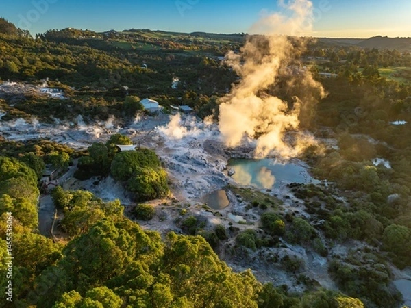 Fototapeta Aerial view of Wai-O-Tapu geothermal area in Rotorua, New Zealand. Steam rises from the hot springs and mud pools, a popular tourist destination.