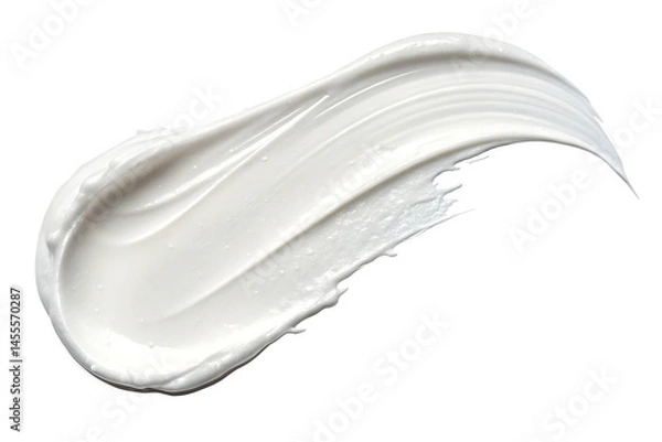 Fototapeta A creamy white swirl of lotion or moisturizer against a stark black background in a studio shot