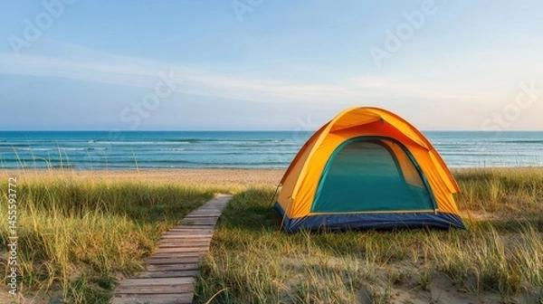 Obraz Bright Yellow Tent by Tranquil Beach at Sunrise with Calm Waves